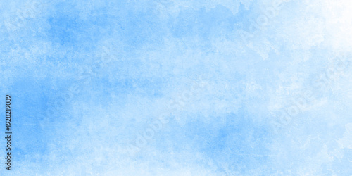 Abstract grunge watercolor background in soft light blue and pale cyan tones, with irregular splashes, ink blots. blue marble texture. blue ice on watercolor and snow.