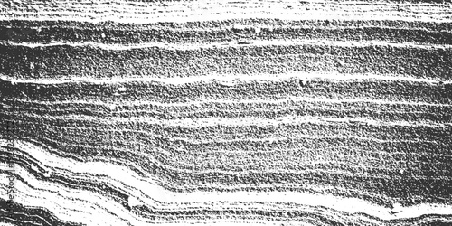 Black and white textured horizontal stripes with rough granular detail