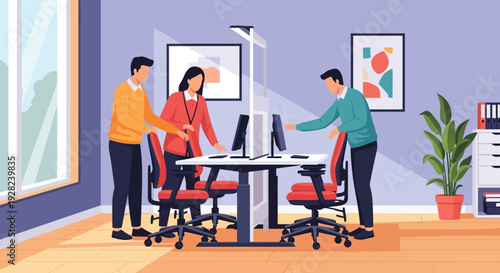 Three Colleagues Working Together at Desk.