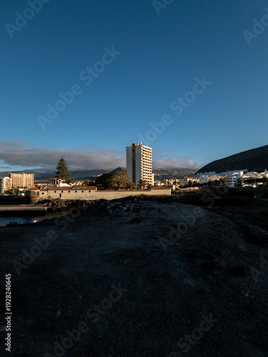 Urban waterfront and mountains in Los Cristianos Tenerife