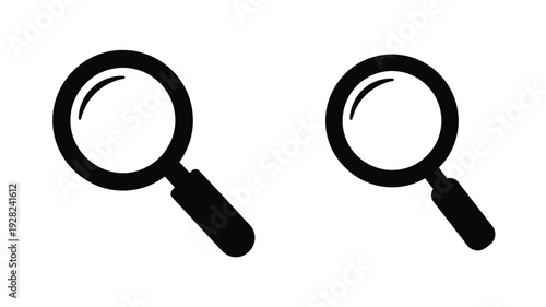 Two black magnifying glasses displayed against a white background silhouette