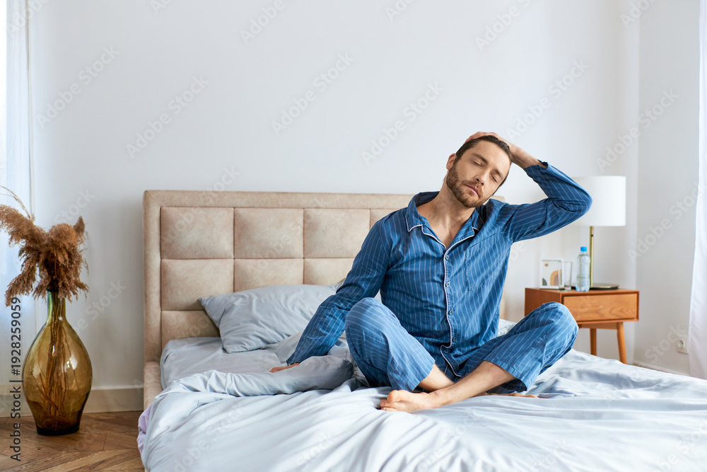 Fototapeta premium Relaxed man enjoying a peaceful morning moment at home in comfortable surroundings