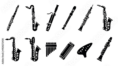 Collection of black silhouette wind instruments including the saxophone, flute, clarinet, oboe, and harmonica in a simple glyph icon style set for musical concepts