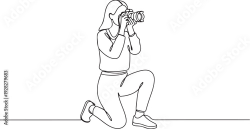 Photographer capturing a moment with a professional camera on a tripod