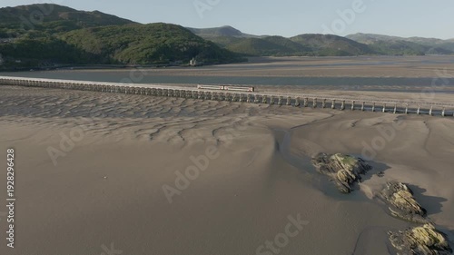 Moving Train Bridge Viaduct Barmouth Estuary Aerial View Low Tide Wales