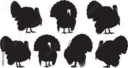A collection of eight black silhouettes of turkeys in various poses.