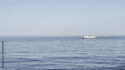 Boat moving on ocean water in daytime