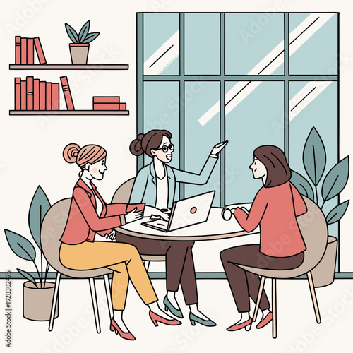 young couple at the table. Female coworkers engaging in a productive discussion at the office