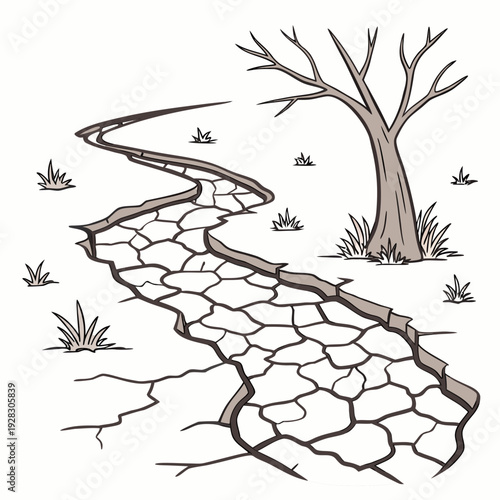 Dry cracked earth with bare tree and grass desert