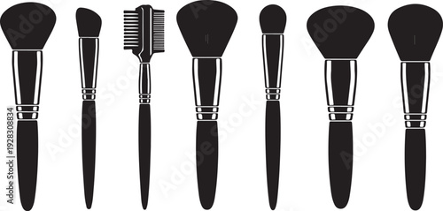 Assorted makeup brushes displayed in a row against a white background