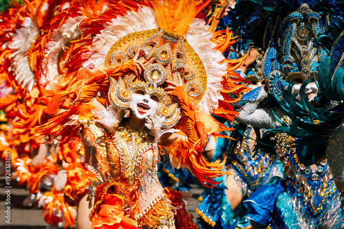 Cebu City, Philippines - 18 January 2026: View of vibrantly costumed performers celebrating with feathers and elaborate headdresses, a spectacle of cultural expression.
