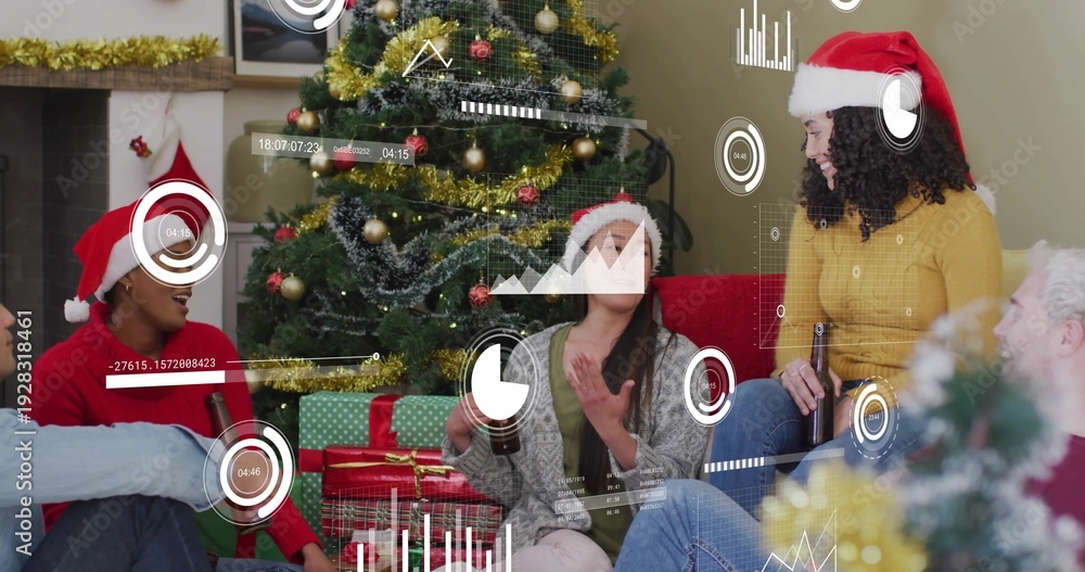 Fototapeta premium Chatting group wearing Santa hats, sitting around Xmas tree with presents at home showing overlays
