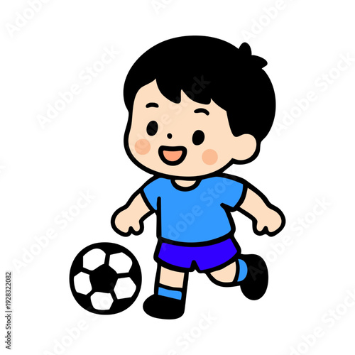 Happy young boy playing soccer with a big smile