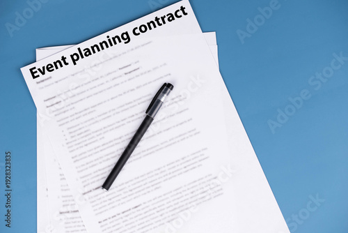 Event planning contract on desk, professional agreement for organizing celebrations and corporate events, symbol of cooperation, creativity, and business partnership.