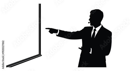 Silhouette of a presenter gesturing towards a blank presentation screen