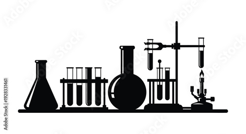 Laboratory equipment arrangement displayed as a striking black silhouette