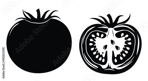 Two tomatoes a whole fruit and a sliced half in silhouette