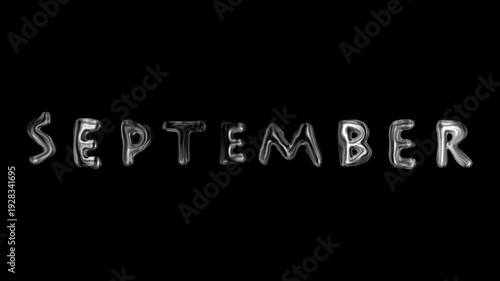 September month name written in silver letters on a black background.