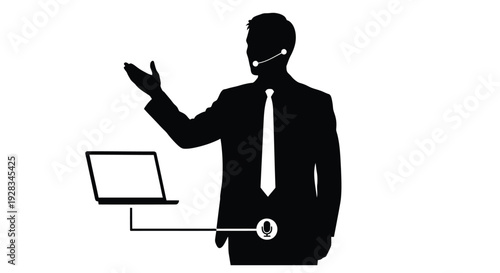 Silhouette of a businessman presenting with a laptop and headset microphone