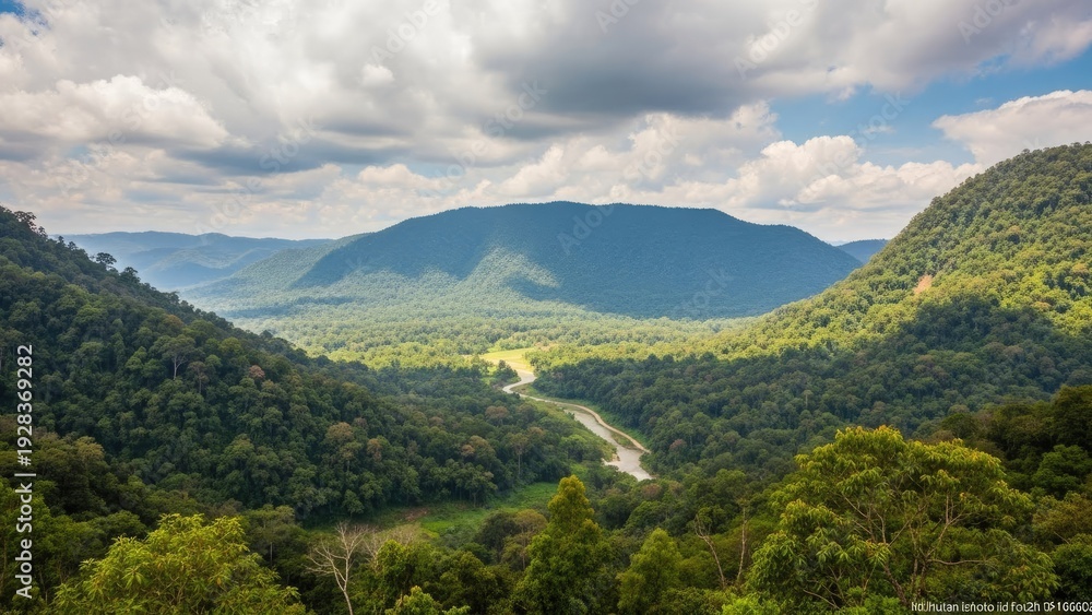 Obraz premium A serene landscape of rolling hills and mountains under a cloudy sky