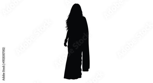 Elegant woman with flowing hair viewed from behind a striking silhouette