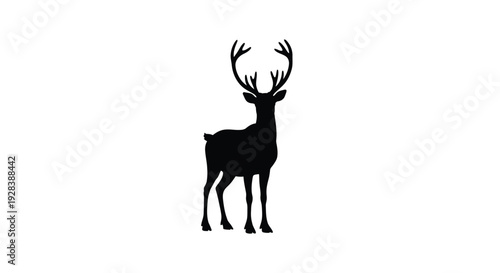 A striking black silhouette of a majestic deer with large antlers