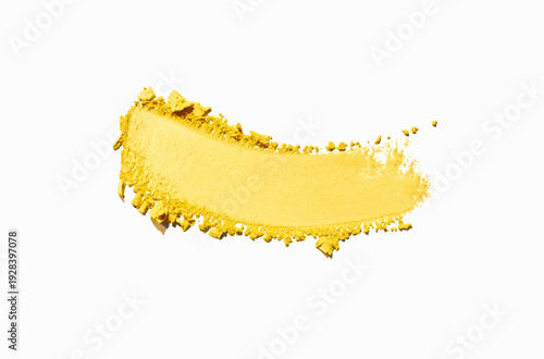 Eye shadow matte yellow yolk texture background white isolated backdrop. Beauty product sample swatch
