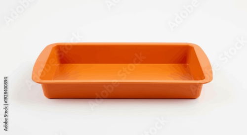 Empty orange ceramic baking dish.
