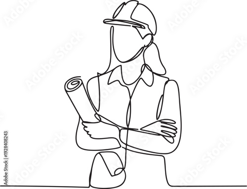 Engineer holding blueprint standing confidently in industrial setting