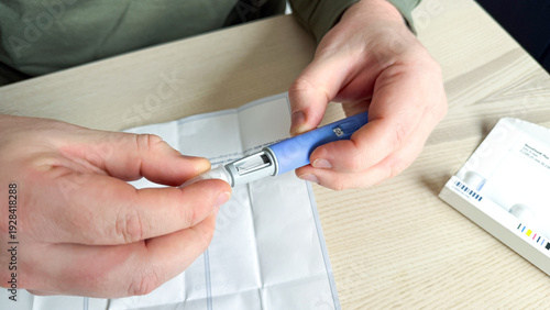 Crafting precision with insulin pen, meticulous care in health ritual, Diwali wellness, diabetes awareness, Caucasian male focus