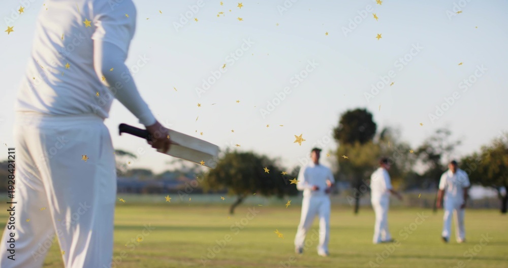 Obraz premium Holding wooden cricket bat, batsman wearing white kit at local park with gold confetti, copy space