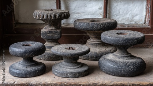Wallpaper Mural A Collection of Intricately Carved Ancient Stone Weights Exhibiting Historical Significance and Traditional Craftsmanship Torontodigital.ca