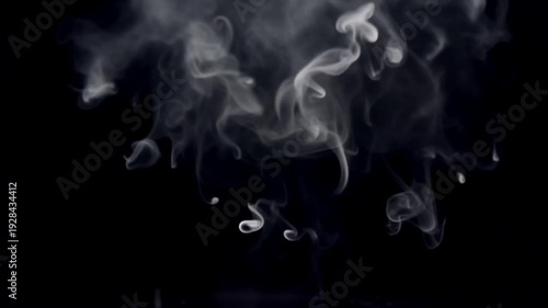 Wallpaper Mural A delicate heart shape formed by swirling white smoke against a dark background, symbolizing love and creativity Torontodigital.ca