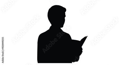 Silhouette of a man in a suit holding papers viewed from a side angle