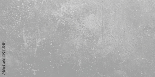 A vintage black and white grunge wall background featuring a rough concrete surface with a dirty marble pattern and grey textured cement paint design