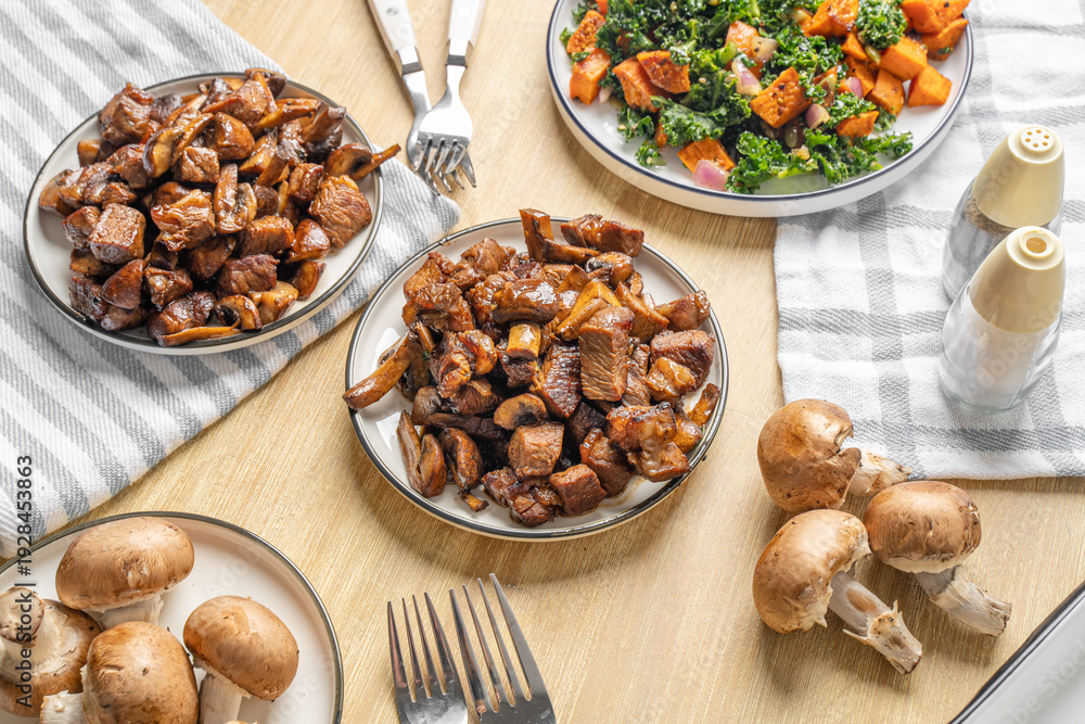 Obraz premium Marinated steak tips with mushrooms. Beef dinner dish