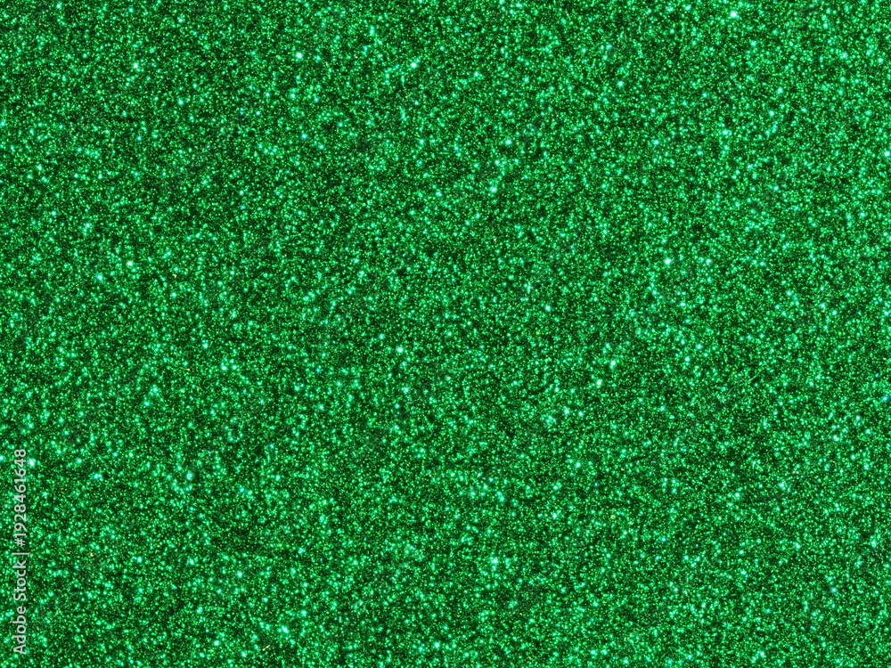 Fototapeta premium Macro photography of bright green metallic paint texture with sparkling flakes
