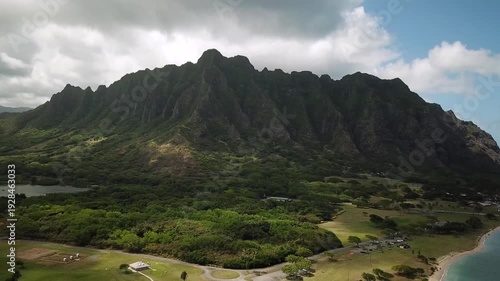 Hawaiian Mountains at Kualoa Ranch, Oahu, drone footage, Hawaii. Majestic green mountains. Filming location in Hawaii. High quality 4k footage