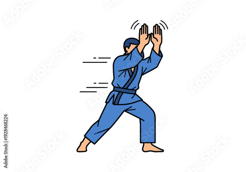 Martial artist in blue uniform performing a defensive stance with open hands.