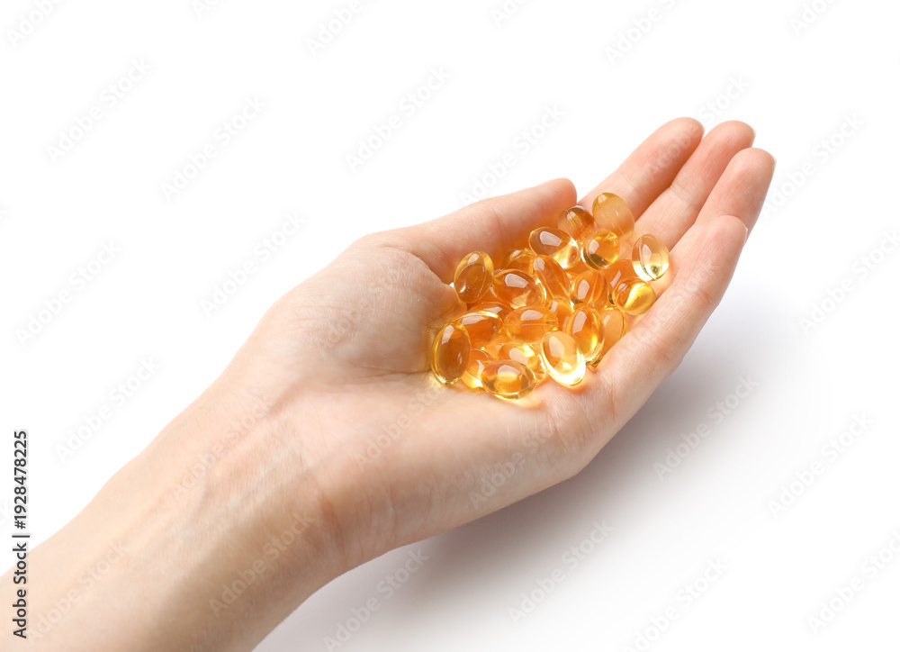 Fototapeta premium Woman with gelatin capsules on white background, closeup