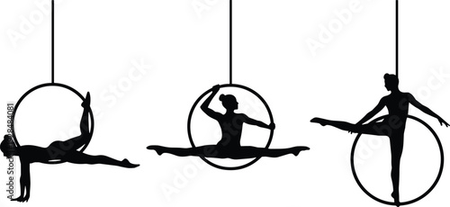 Black silhouettes of aerial hoop performers doing artistic gymnastic poses and acrobatic splits on lyra rings isolated on white background.