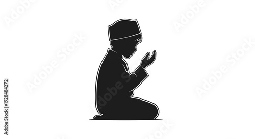 Man Praying in Islamic Attire Silhouette.