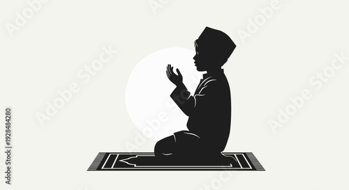 Man Praying on Prayer Mat Silhouette.
