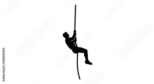 Silhouette of a Climber Scaling a Rope Against Clear Sky