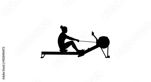 Silhouette of a person using a rowing machine in exercise