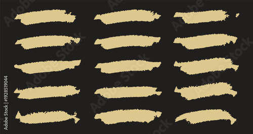 A collection of 15 beige brushstrokes on a black background
