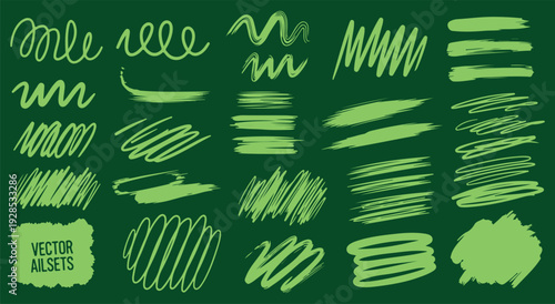 Collection of various green brush strokes and line art elements on a dark background