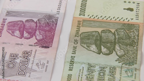 Close up of paper printed money in twenty billion, 200 thousand, and one dollar bill of Zimbabwe reserve bank inflated and inflation economy valueless moneys and poverty from 2020s in foreign value