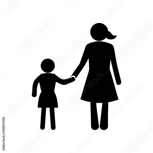 A woman holding hands with a child walking together outdoors