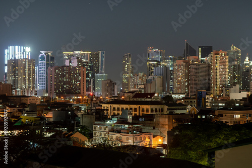 Photos Manila Philippines night skyline with illuminated skyscrapers and city lights